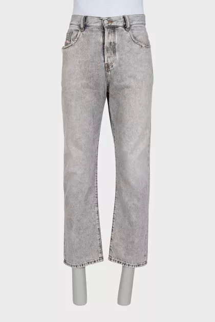 Men's gray jeans with distressed pockets