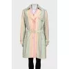 Multicolored trench coat with a belt