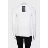 White jumper with gold decor on the sleeves