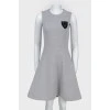 Sleeveless dress with a sun skirt