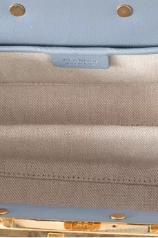 Suede bag with gold hardware