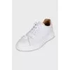 Men's white sneakers with logo
