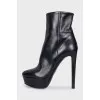 Leather ankle boots with stiletto heels and platform