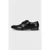 Men's leather shoes with perforated toes