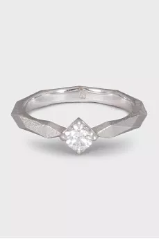 White gold ring with a diamond