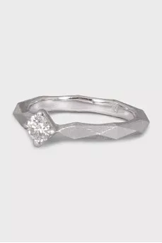 White gold ring with a diamond