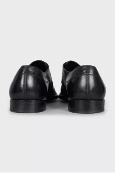 Men's black shoes with a long toe