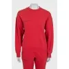 Red sweatshirt and tapered trousers suit