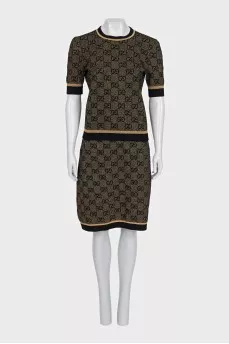 Skirt suit with a gold print