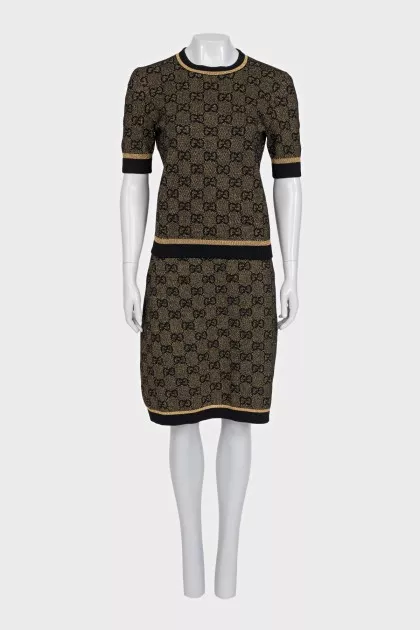 Skirt suit with a gold print