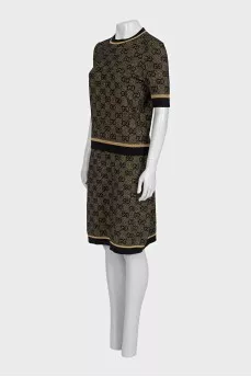 Skirt suit with a gold print