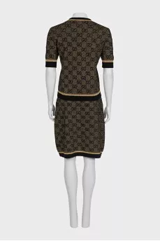 Skirt suit with a gold print