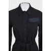 Fitted dress with buttons and a belt