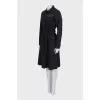 Fitted dress with buttons and a belt