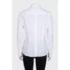 Fitted shirt decorated with rhinestones