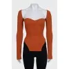 Orange ribbed long sleeve top