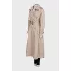 Trench coat with a buttoned belt