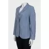 Fitted jacket with a button