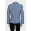 Fitted jacket with a button