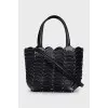 Leather bag with metal details