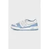 Light blue sneakers with a signature print