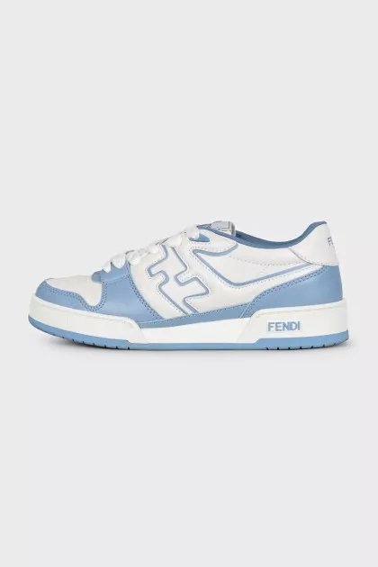 Light blue sneakers with a signature print