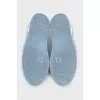 Light blue sneakers with a signature print