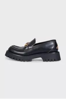Leather loafers with embroidered heel