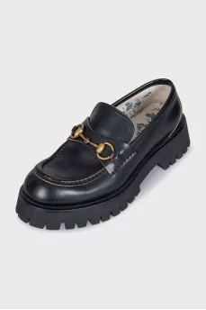 Leather loafers with embroidered heel