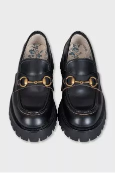 Leather loafers with embroidered heel