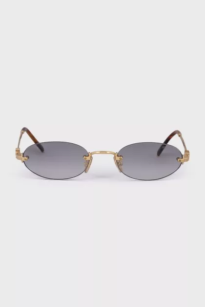 Oval sunglasses with gold hardware