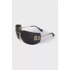 Wide sunglasses with gold logo