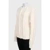 Бежевий светр із вовни