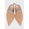 Beige patent leather pumps