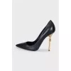 Black shoes with a curved heel