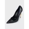 Black shoes with a curved heel