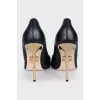 Black shoes with a curved heel