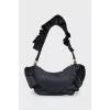Black bag decorated with chains