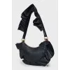 Black bag decorated with chains
