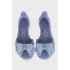 Silicone sandals decorated with a bow