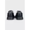 Black leather sneakers