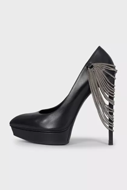 Leather high heels decorated with chains