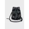 Bucket bag with a strap