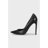 Black leather pointed toe pumps