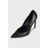 Black leather pointed toe pumps