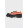 Текстильные оранжевые кроссовки