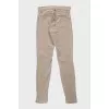 Low-waist tapered trousers with pockets