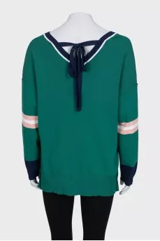 Oversized pullover decorated with crystals