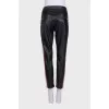 Black trousers with colored leather inserts