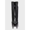 High-heeled leather boots